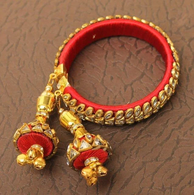 Women's custom design bangles-Designer Kundan Silk thread Adjustable Bracelet With Latkan Red