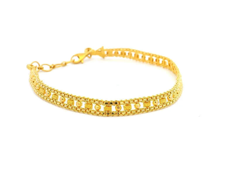 Women's evil eye bangles-22ct Yellow Gold Flat Bracelet with Intricate Filigree Work Design – Elegant Gold Jewellery