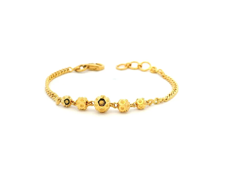 Luxury women's bangles-22ct Yellow Gold Children's Bracelet with Diamond-Cut Beads & Lobster Claw Clasp – Stylish Kids Jewellery